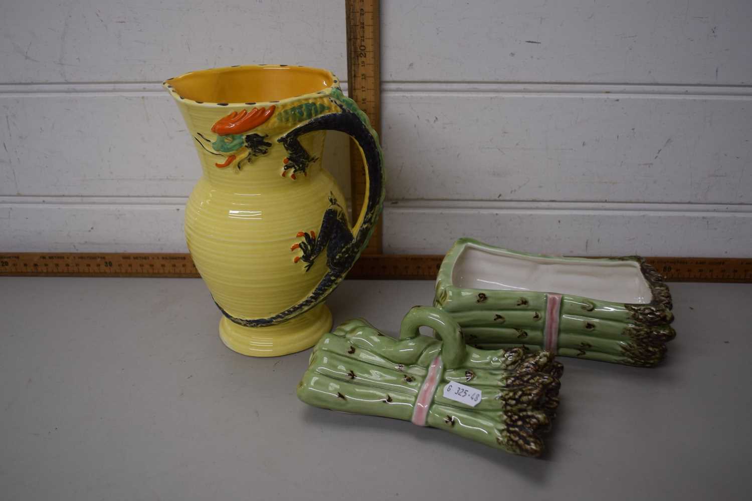 An asparagus jug and a yellow dragon jug (2)