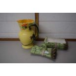 An asparagus jug and a yellow dragon jug (2)