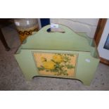 Green painted magazine rack with picture of yellow roses to front