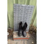 A pair of mens Dunlop safety boots together with a metal tool box and metal wall bracket