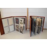 Two assorted postcard albums