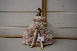 Dresden figure of a seated lady in pink