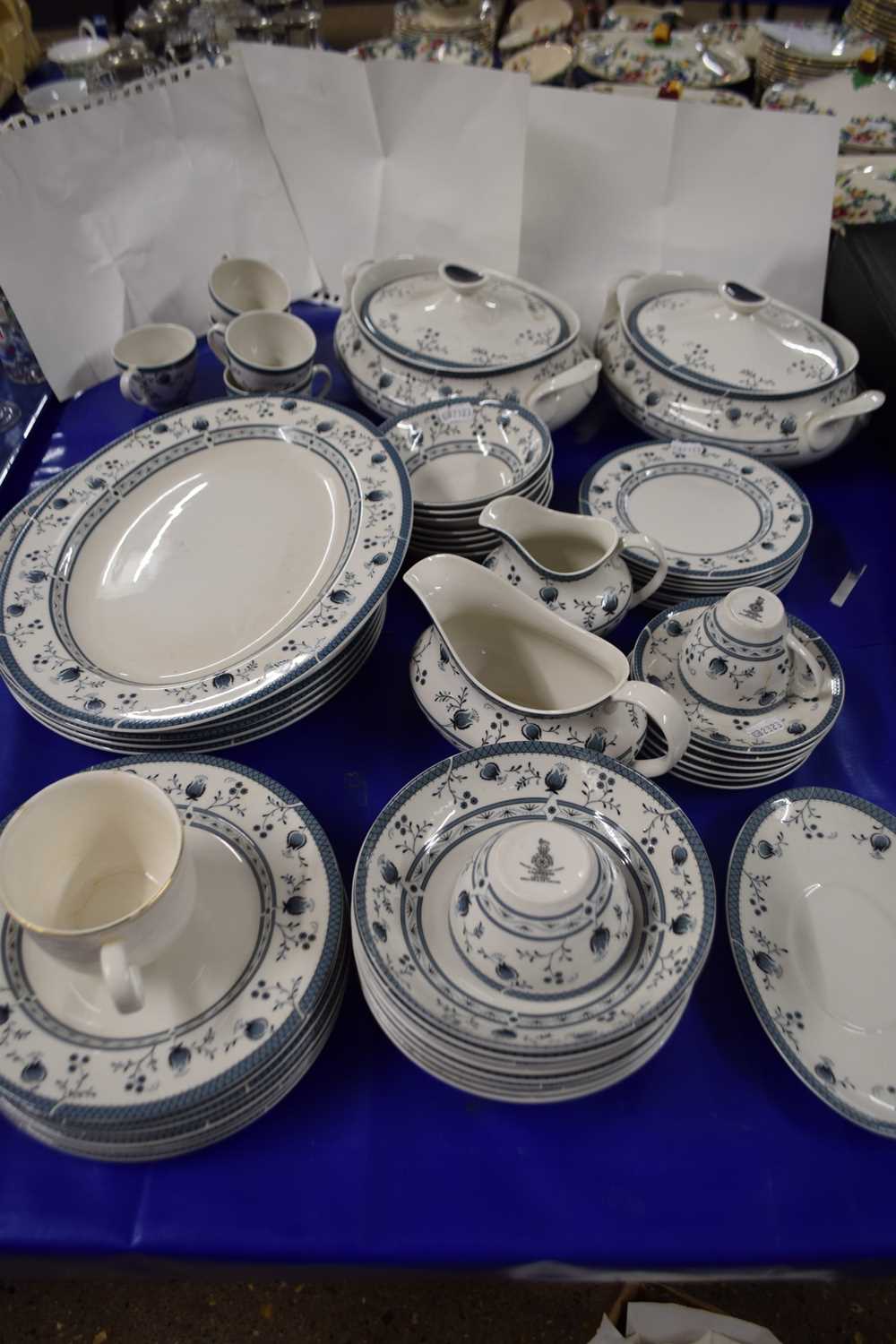 A quantity of Royal Doulton dinner ware in the Cambridge pattern comprising two tureens, serving