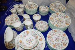 Quantity of Minton Haddon Hall dinner and tea wares including dinner plates, soup bowls, cups and