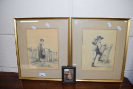 A pencil drawing of a Victorian lady together with matching drawing of a boy in wooden frames