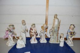 Group of ceramic figures including four figures of cherubs emblematic of the arts in Meissen style