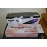 Bush wet and dry hand held vacuum, boxed together with a Remington rose pearl curling wand, boxed