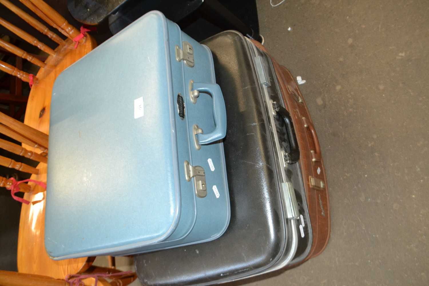 Three vintage suitcases