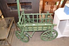 A green painted garden cart