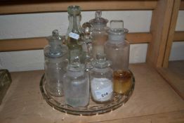 Quantity of various small glass bottles and tray