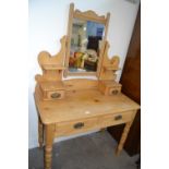 Pine dressing table with mirror above, two drawers below and turned legs, approx 99cm wide