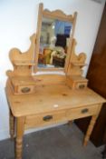 Pine dressing table with mirror above, two drawers below and turned legs, approx 99cm wide