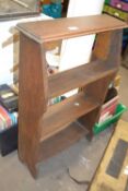 A small wooden bookshelf, 62cm wide