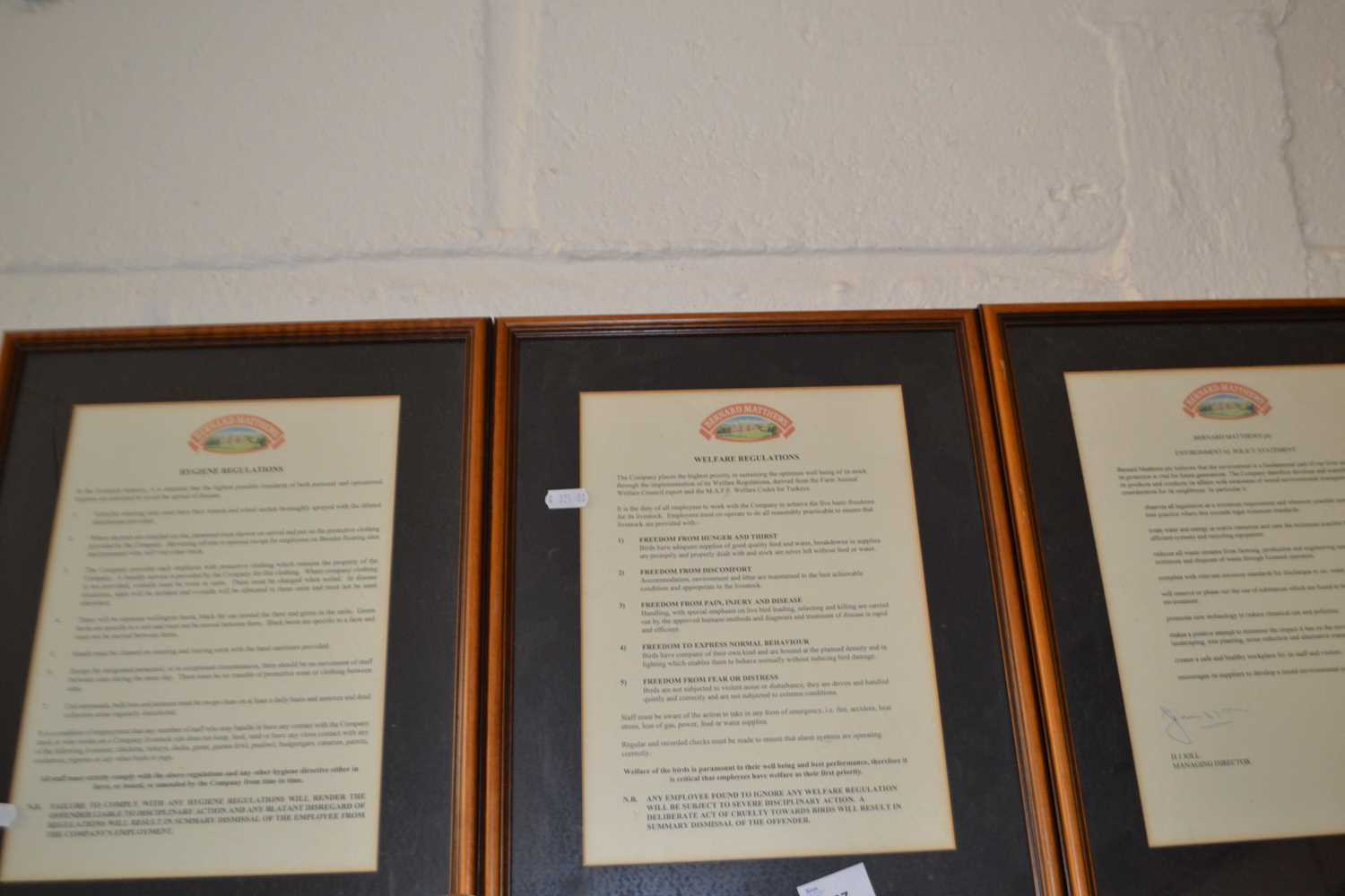 Three framed Bernard Matthews regulation signs