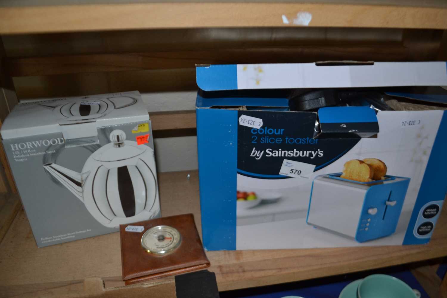 Boxed toaster, teapot and thermometer