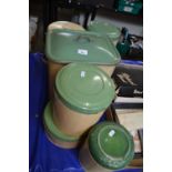 Set of six vintage green and cream painted enamel kitchen tins