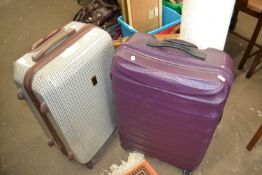 Two hardshell suitcases