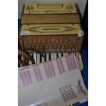 A Hohner accordion (a/f) together with sheet music