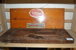 A wooden cased Presto tap and die set