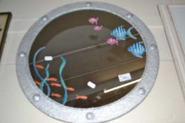 Round wall mirror with painted silver frame and decorative glass fish