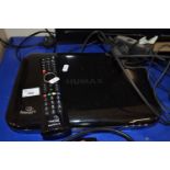 A Humax Freesat viewer with remote control