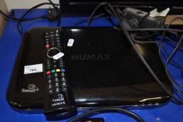 A Humax Freesat viewer with remote control