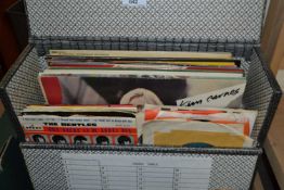 Quantity of assorted LP's and singles to include Spanish version of A Hard Days Night by the Beatles