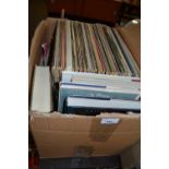 Quantity of assorted LP's and hard back books