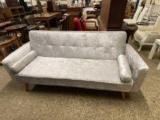 Modern pale grey velvet upholstered Clik Clak sofabed with baluster cushions