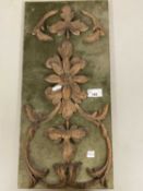 Carved oak floral decorated panel