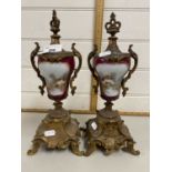 Pair of continental porcelain and metal mounted garniture vases