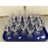 A tray of assorted clear drinking glasses