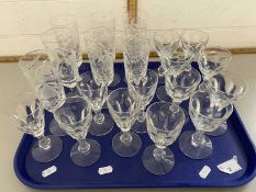 A tray of assorted clear drinking glasses