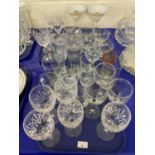 Two trays of various drinking glasses