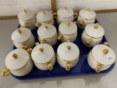 Set of twelve gilt decorated French covered soup dishes