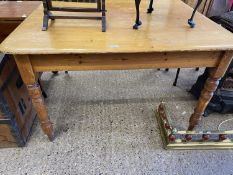 Stained pine kitchen table on turned legs, 120cm wide