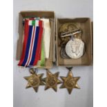 WWII Interest - A group of medals comprising the 1939-1945 Star, the Africa Star, the Italy Star,