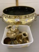 An oval brass jardiniere together with brass chamber sticks and a selection of brass weights