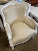 20th Century continental style armchair with pale upholstery and a white painted frame
