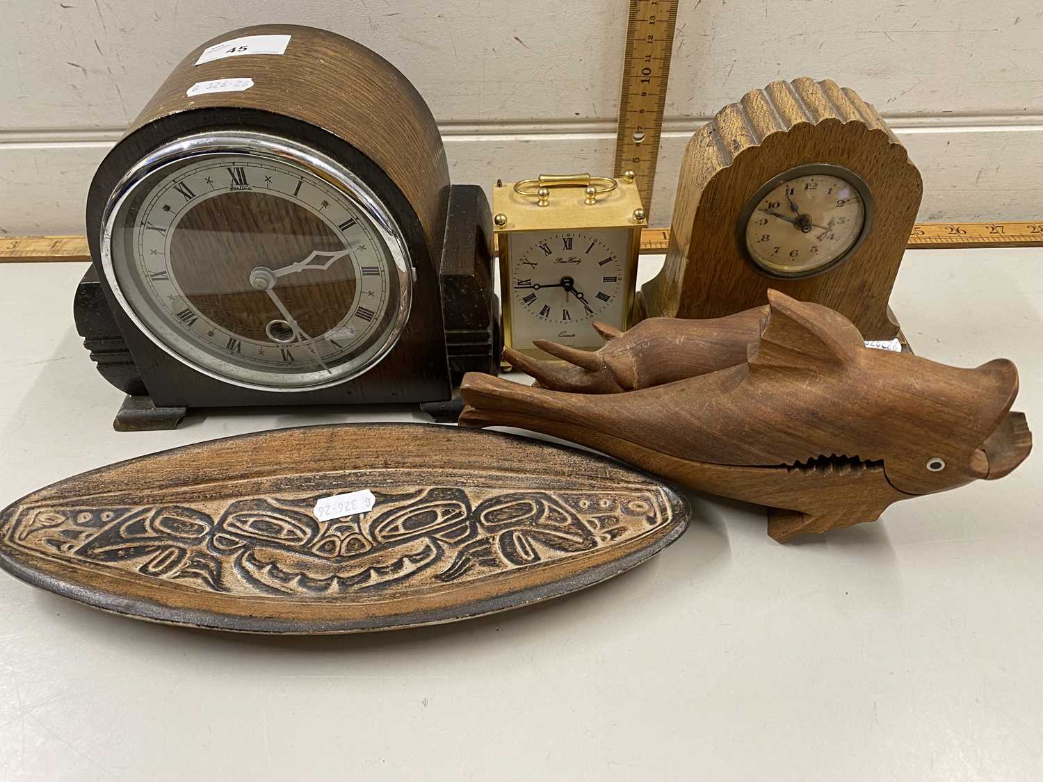 Mixed Lot: Three various assorted small mantel clocks together with wooden nut crackers, wooden