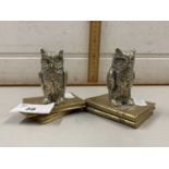 Pair of small owl formed metal paperweights