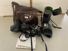Mixed Lot: Camera equipment comprising an Olympus OM1 camera with lenses and various accessories