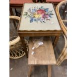 Needlework and glass topped side table together with a pine stool