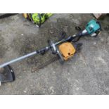 A petrol strimmer together with a McCulloch petrol chainsaw (2)