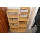 Two pine stepped shelf bookcases each approx 60cm wide