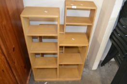 Two pine stepped shelf bookcases each approx 60cm wide