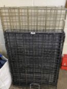 Two folding dog cages