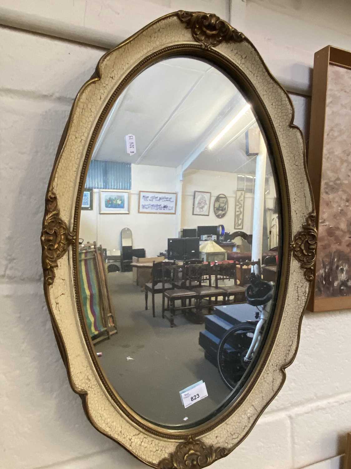 Cream and gilt crackle glazed framed over wall mirror