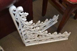 Pair of white painted cast iron supports