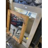 Two pine framed wall mirrors